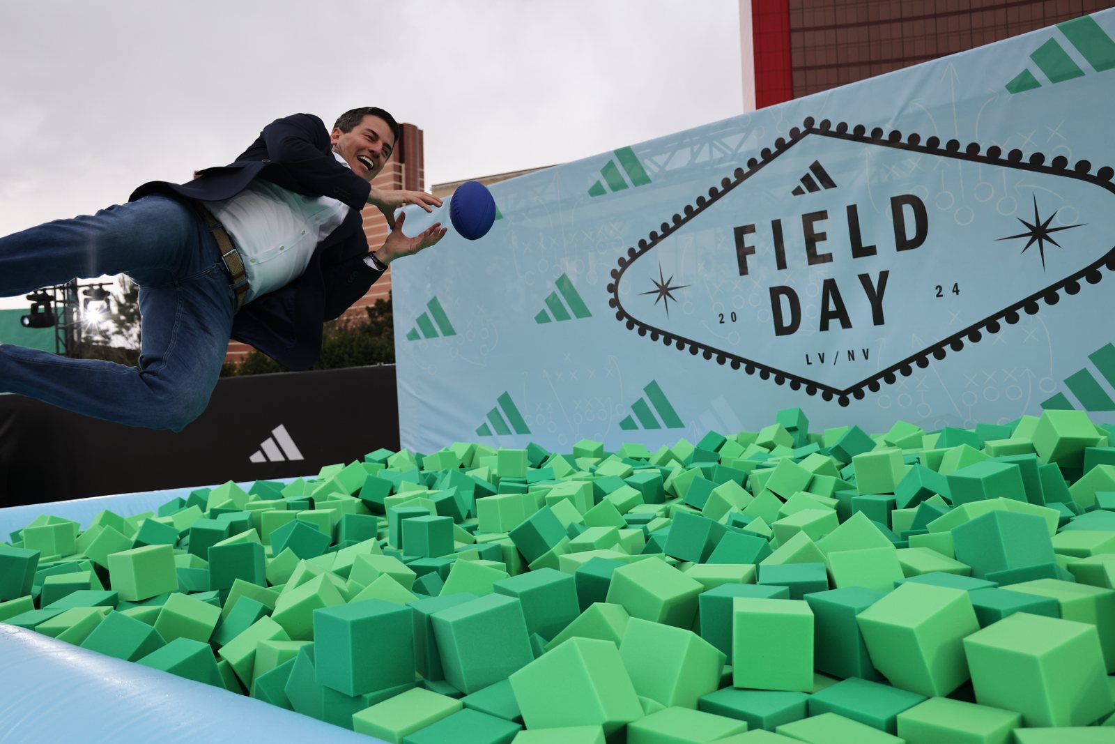 Adidas Field Day Super Bowl activation — mid-air dive into the foam pit
